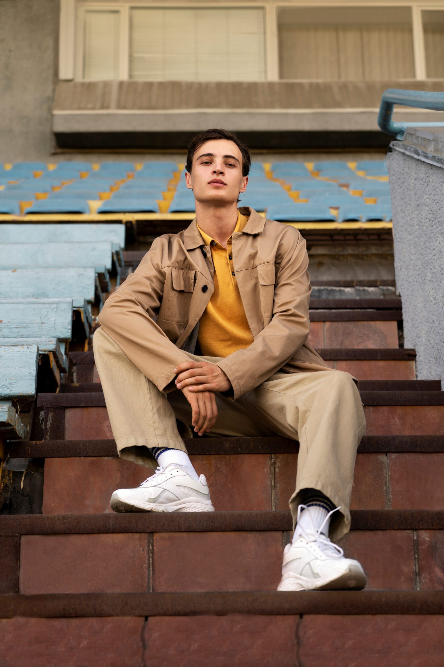 full-shot-man-posing-stairs